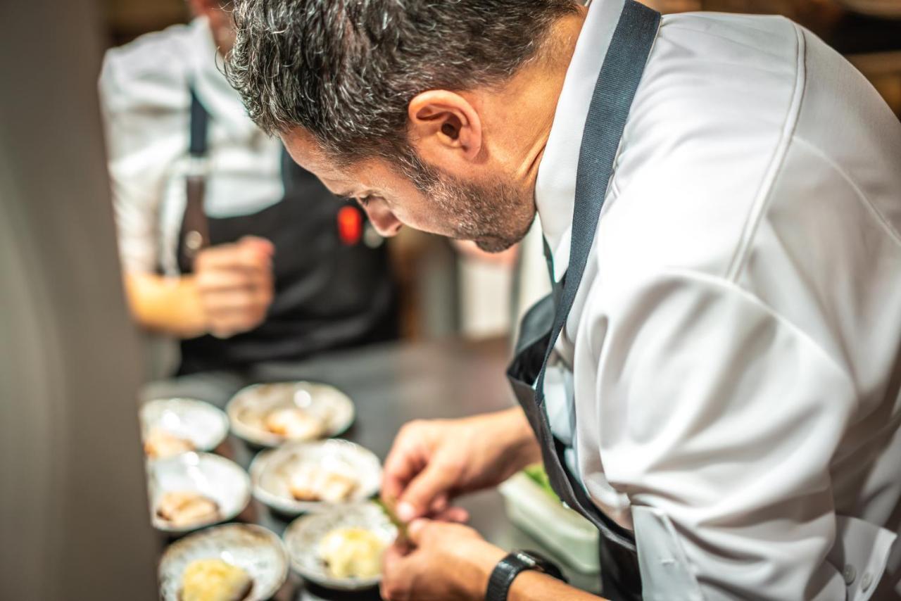 เอล ยอเรนซ์ ปาร์ก เดลา มาร์ Hotel ปัลมาเดมายอร์กา ภายนอก รูปภาพ Chef preparing food